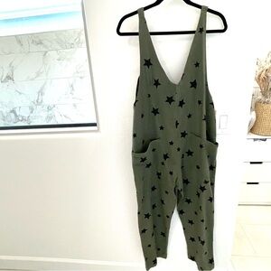 Talulah Olive Jumpsuit with Black Star Pattern